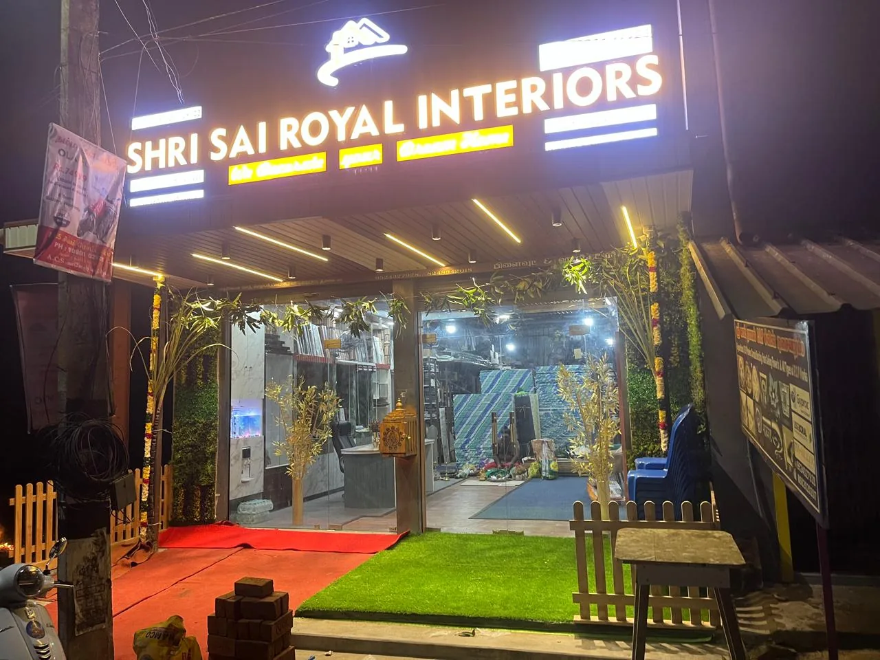 Shri Sai Royal Interiors showroom in Arni at night